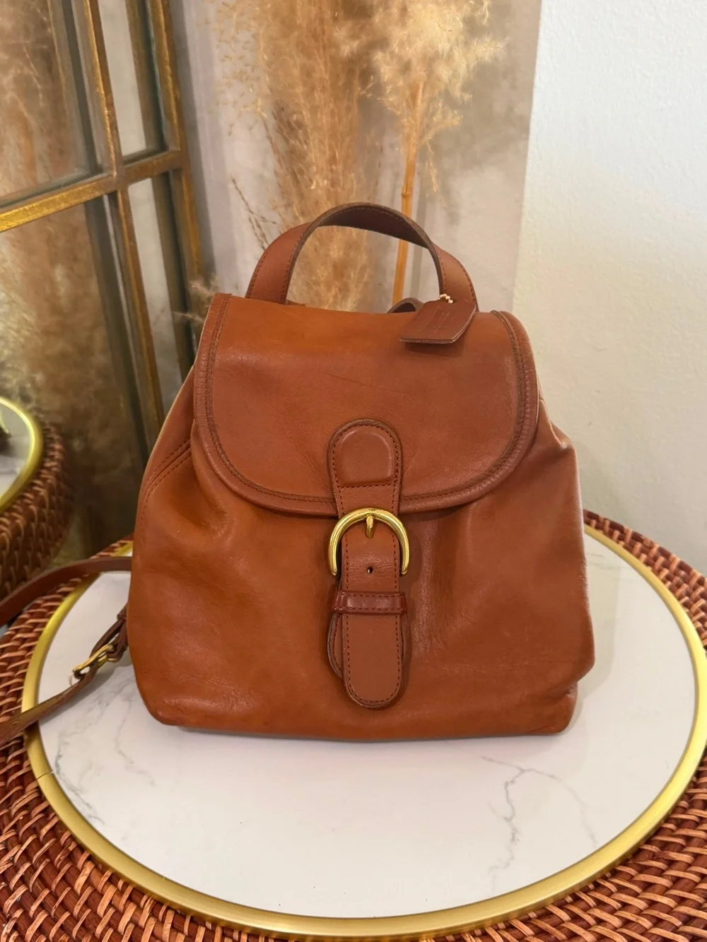 Coach vintage 90’s  Cognac Leather Backpack with Gold Buckle made USA